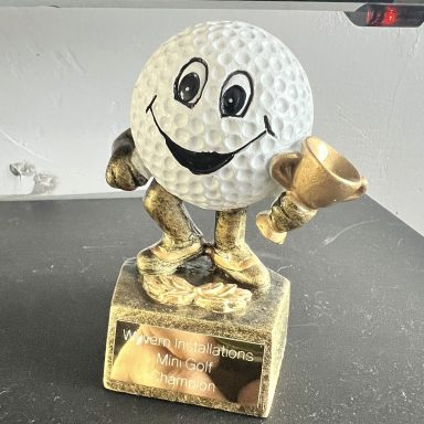 Bailey takes the trophy off Brendan, his 2nd stint of Mini Golf Champion....